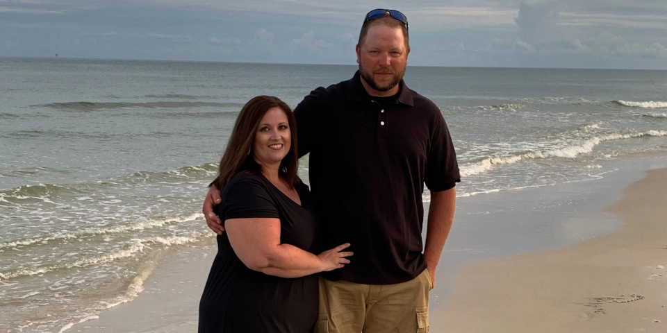 Suzanne Burton before weight loss surgery, pictured with husband on beach Suzanne Burton before weight loss surgery, pictured with husband on beach